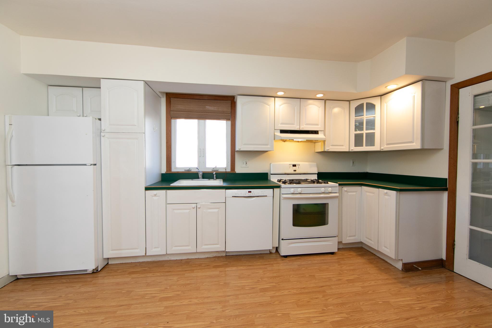 1005 Atsion Road Shamong, NJ 08088 - Photo 13 of 42 a kitchen with a refrigerator and a stove top oven
