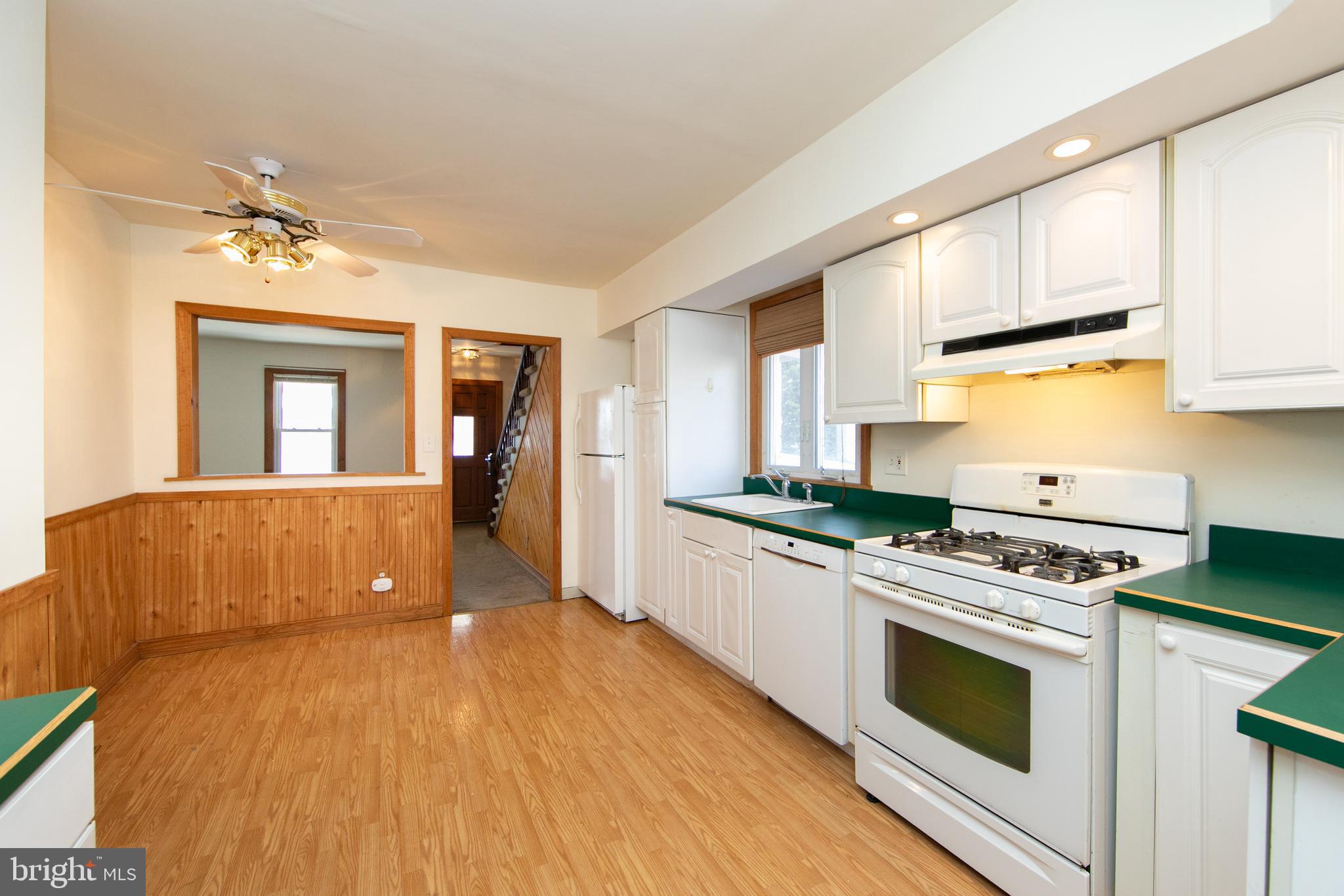 1005 Atsion Road Shamong, NJ 08088 - Photo 14 of 42 a kitchen with a stove a sink and a refrigerator