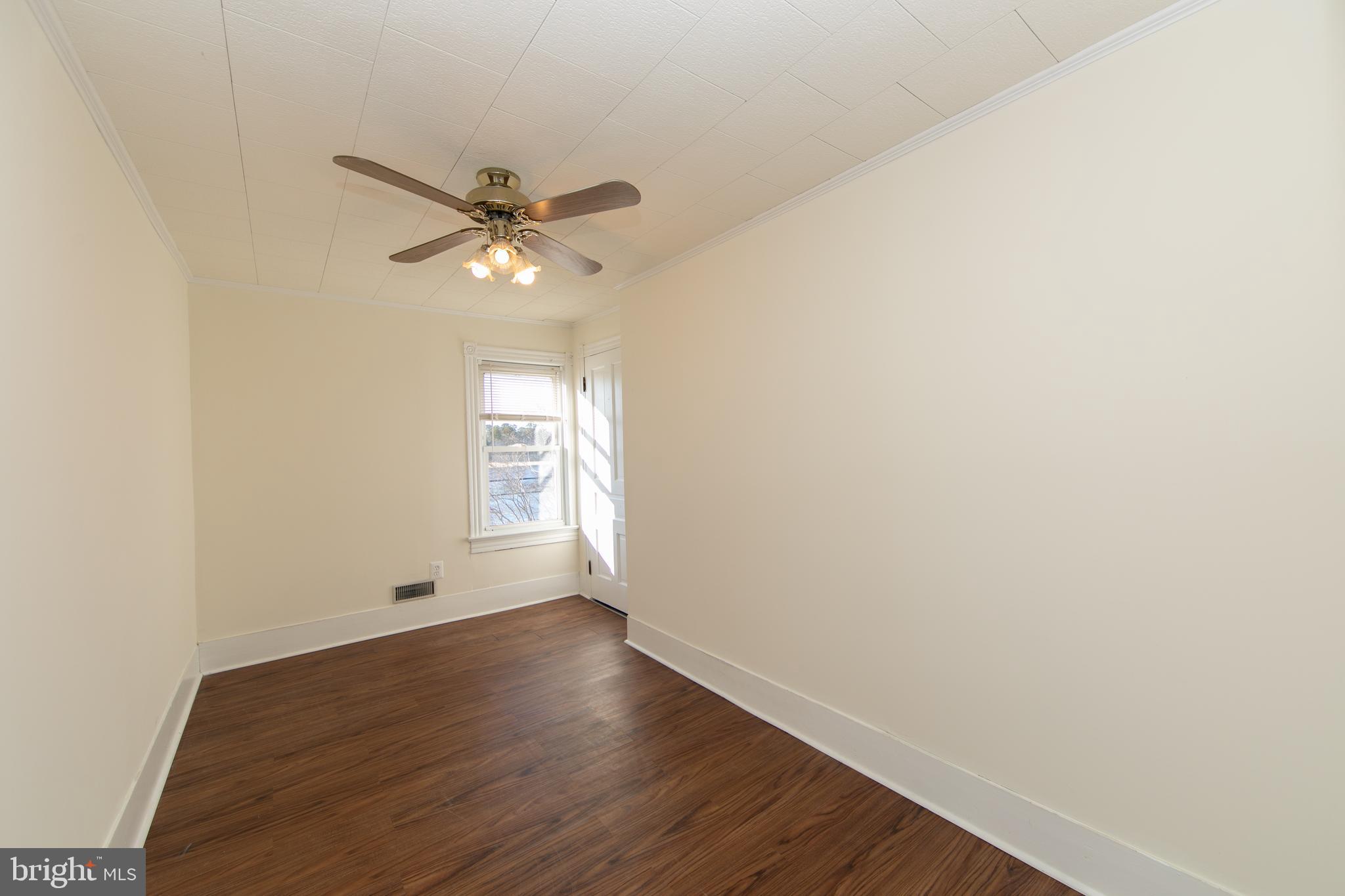 1005 Atsion Road Shamong, NJ 08088 - Photo 27 of 42 an empty room with wooden floor and windows