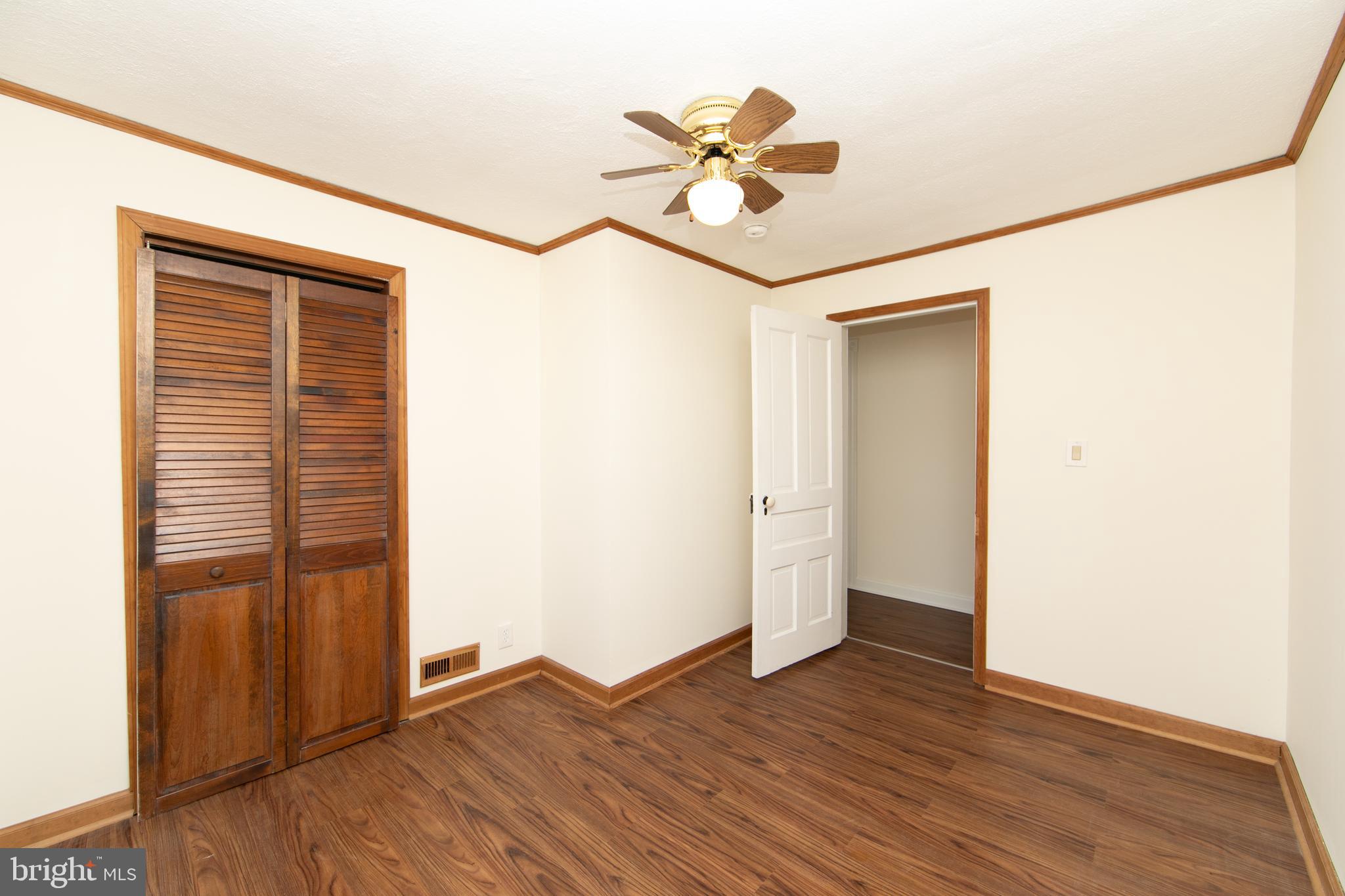 1005 Atsion Road Shamong, NJ 08088 - Photo 30 of 42 a view of empty room with wooden floor and fan