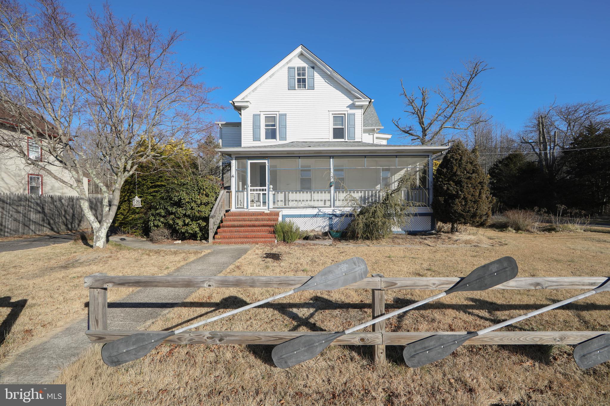 1005 Atsion Road Shamong, NJ 08088 - Photo 34 of 42 a front view of a house with table and chairs