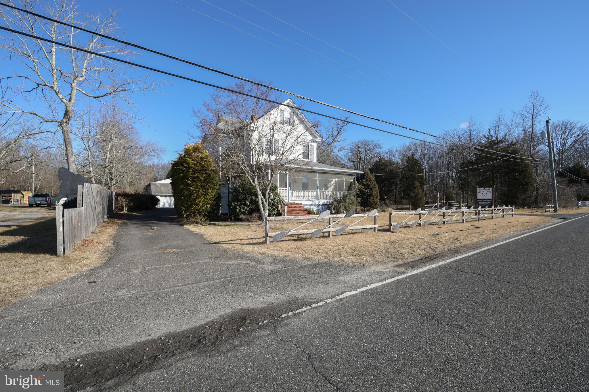 1005 Atsion Road Shamong, NJ 08088 - Photo 41 of 42 a street view with residential house