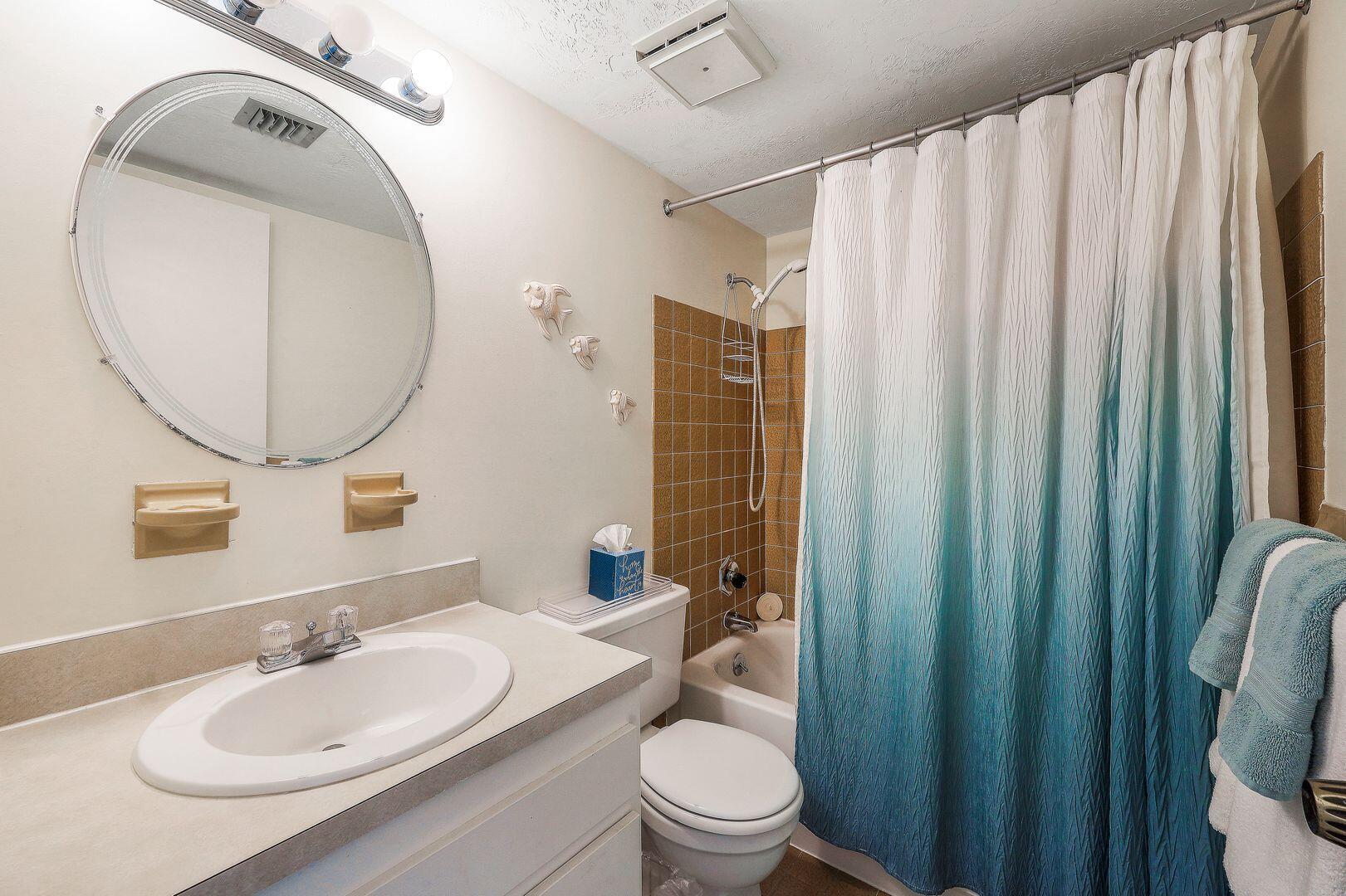 780 San Marco Road, Unit 104 Marco Island, FL 34145 - Photo 15 of 25 a bathroom with a sink toilet and shower