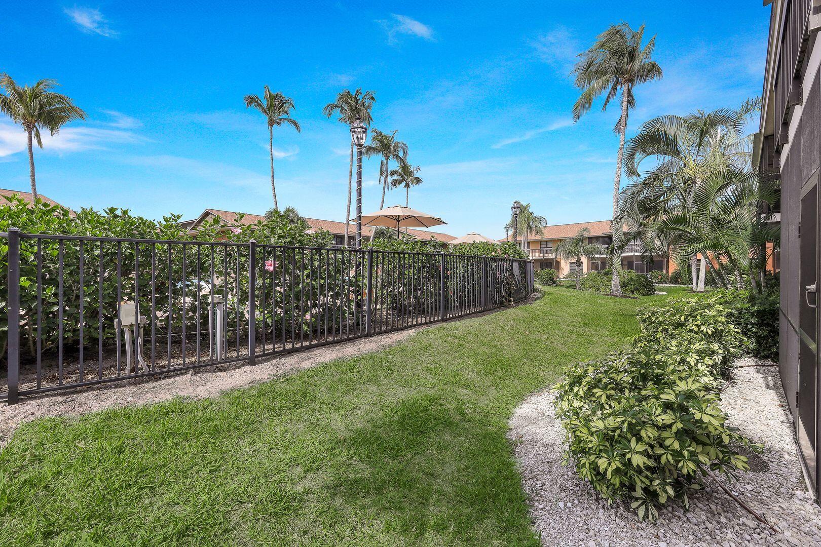 780 San Marco Road, Unit 104 Marco Island, FL 34145 - Photo 19 of 25 a view of a garden