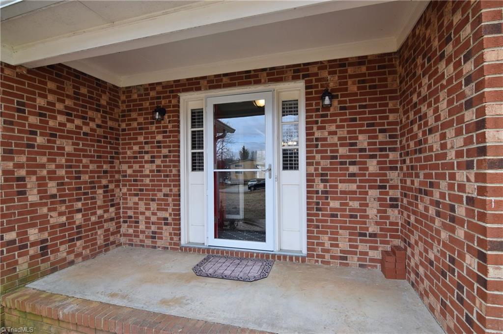 4300 Lormar Road Greensboro, NC 27406 - Photo 2 of 30 Enjoy a covered front entry.