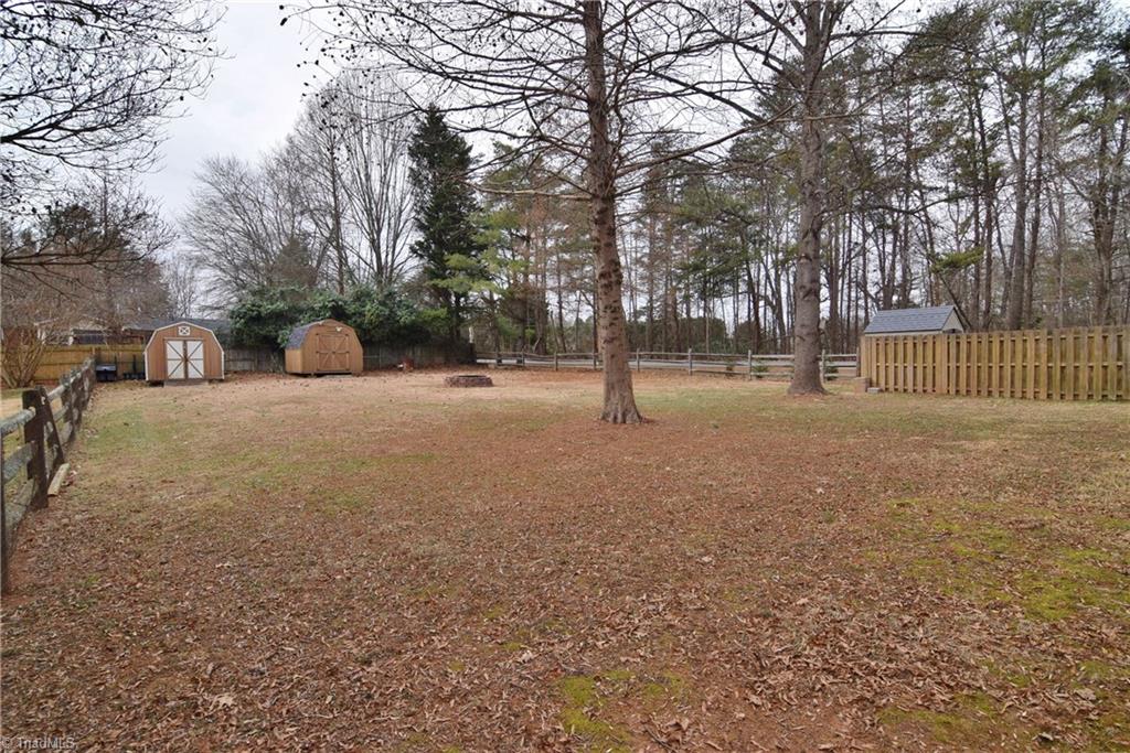 4300 Lormar Road Greensboro, NC 27406 - Photo 26 of 30 Level backyard is fenced.