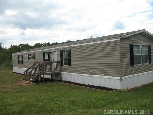 1638 Old Pinckney Road York, SC 29745 - Photo 1 of 16 a house view with a garden space