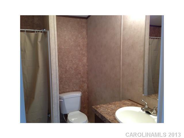1638 Old Pinckney Road York, SC 29745 - Photo 5 of 16 a bathroom with a sink and a toilet