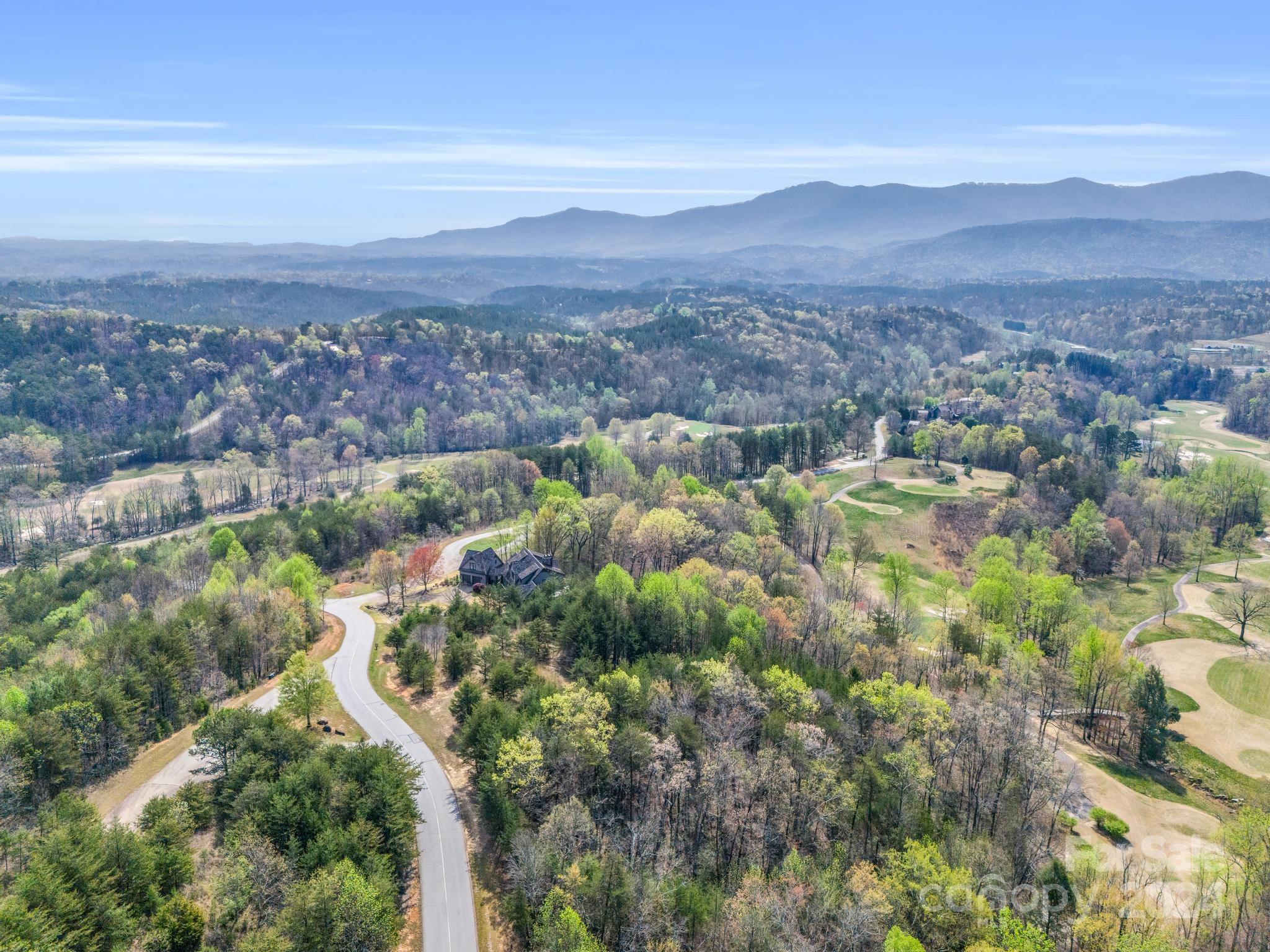 0 Chestertown Drive Mill Spring, NC 28756 - Photo 11 of 34 a view of a city with mountains in the background