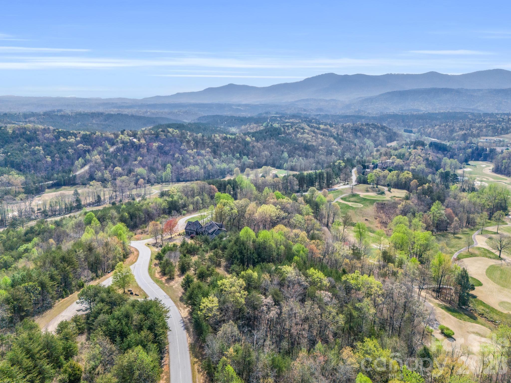 0 Chestertown Drive Mill Spring, NC 28756 - Photo 11 of 35 a view of a city with mountains in the background
