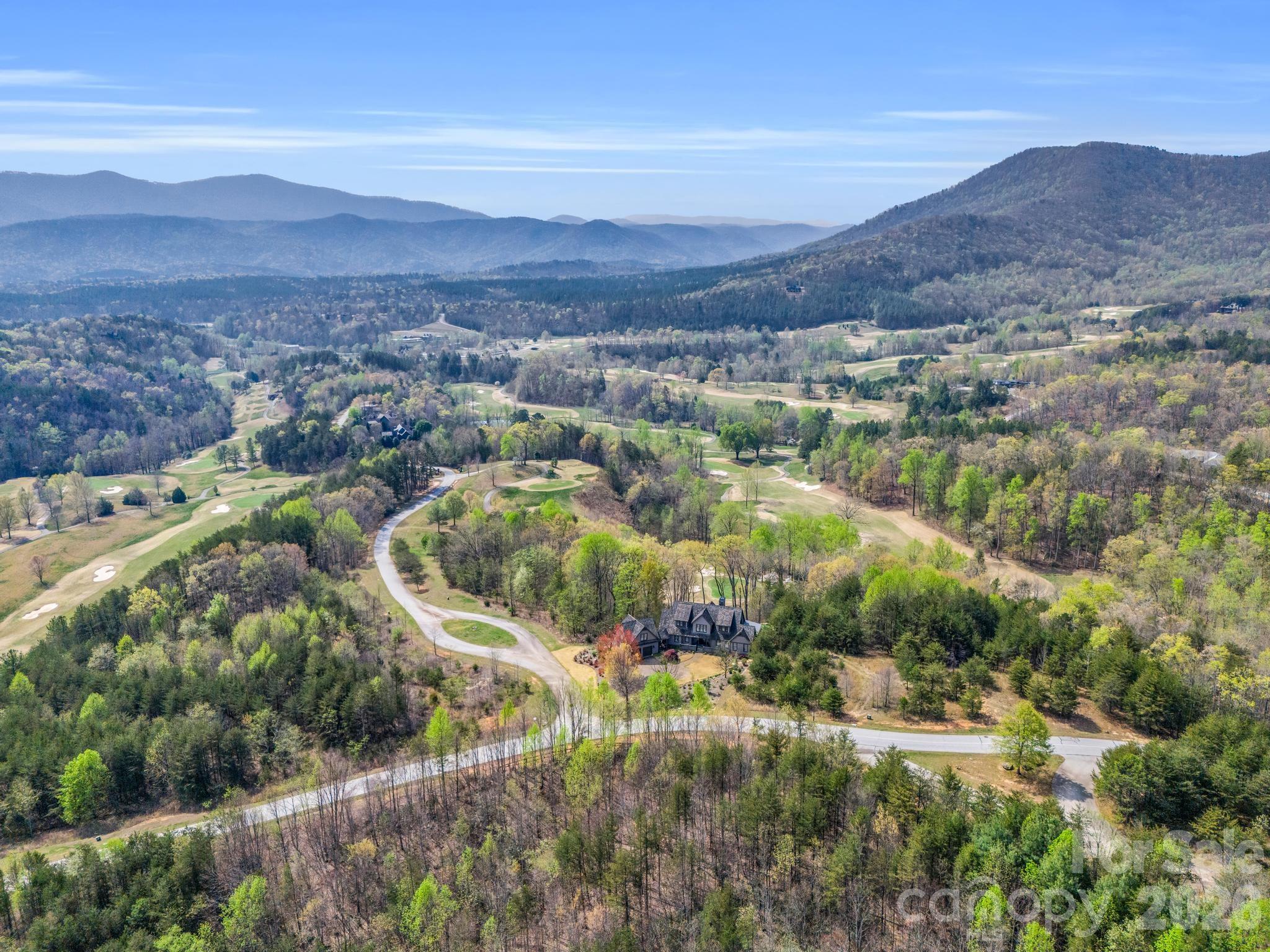 0 Chestertown Drive Mill Spring, NC 28756 - Photo 15 of 35 a view of a city with mountains in the background