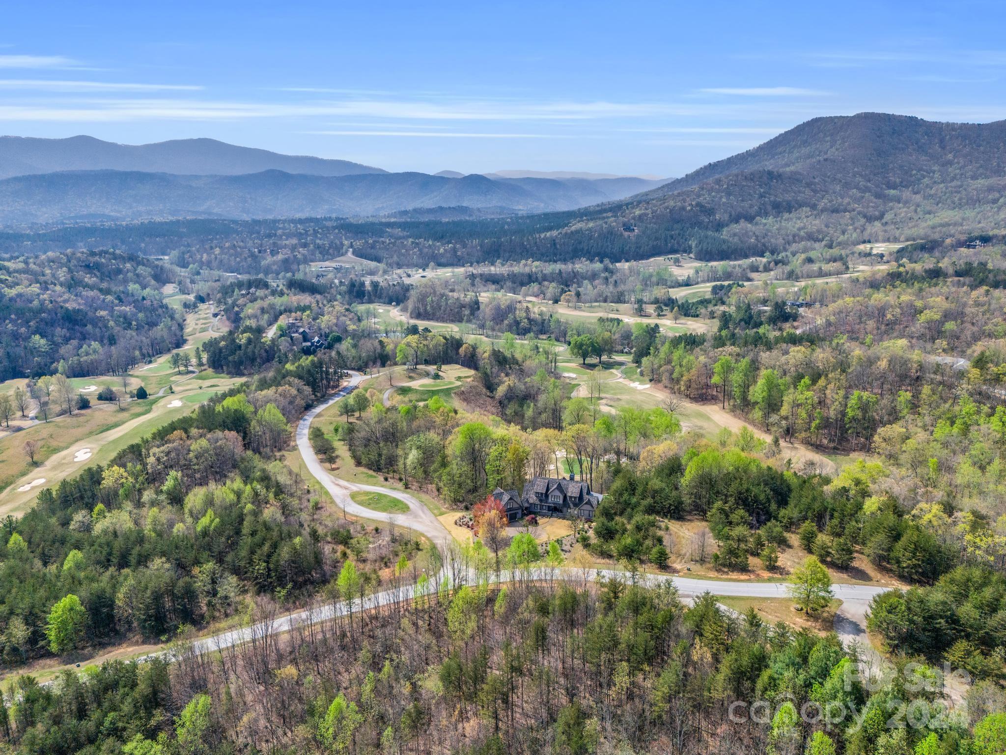 0 Chestertown Drive Mill Spring, NC 28756 - Photo 15 of 34 a view of a city with mountains in the background
