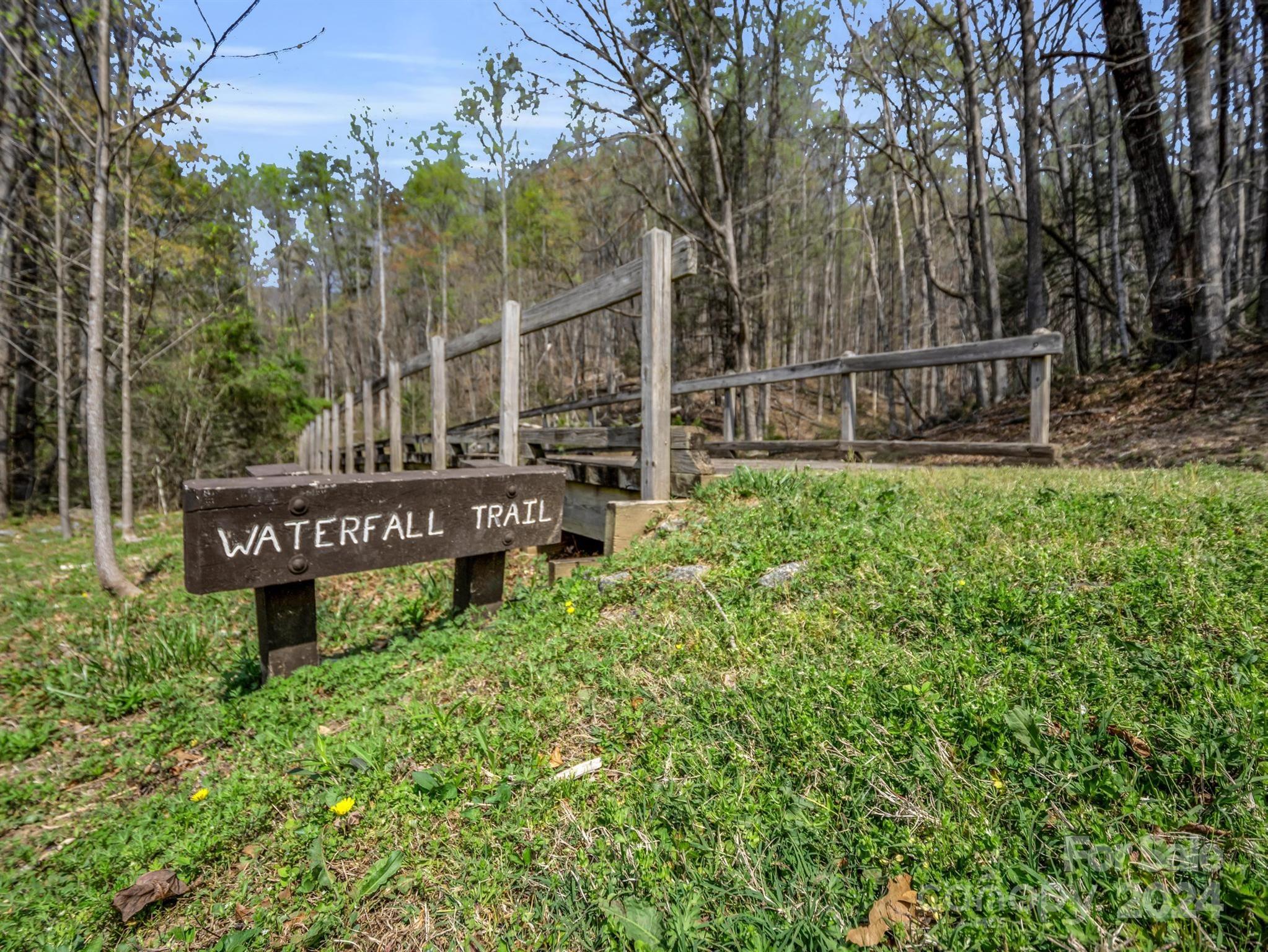 0 Chestertown Drive Mill Spring, NC 28756 - Photo 27 of 34 a view of a street with wooden fence