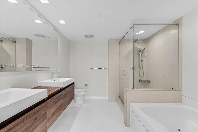 a view of a city with lawn chairs