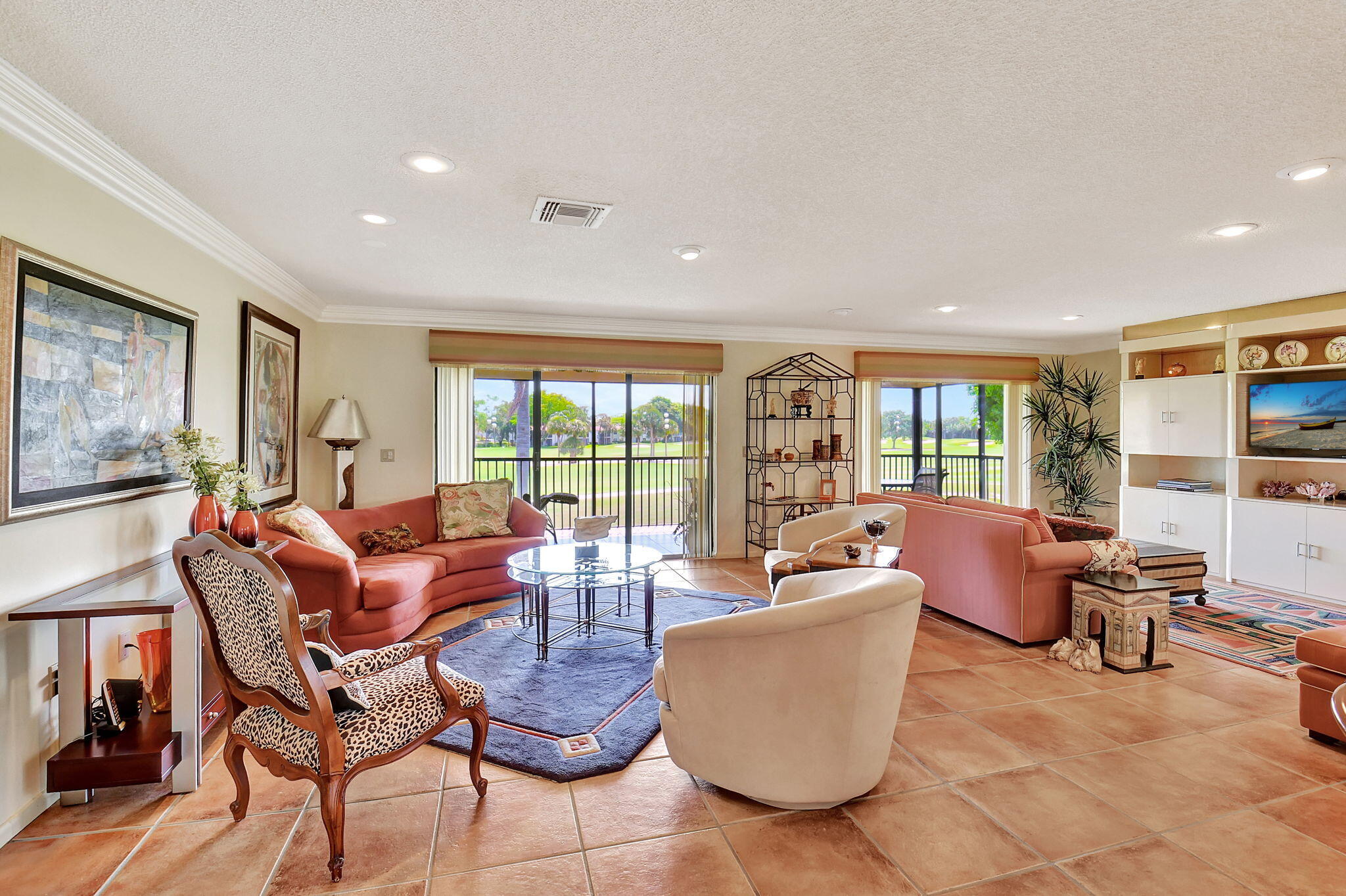 3 Stratford Drive, Unit H Boynton Beach, FL 33436 - Photo 13 of 81 a living room with furniture and large windows