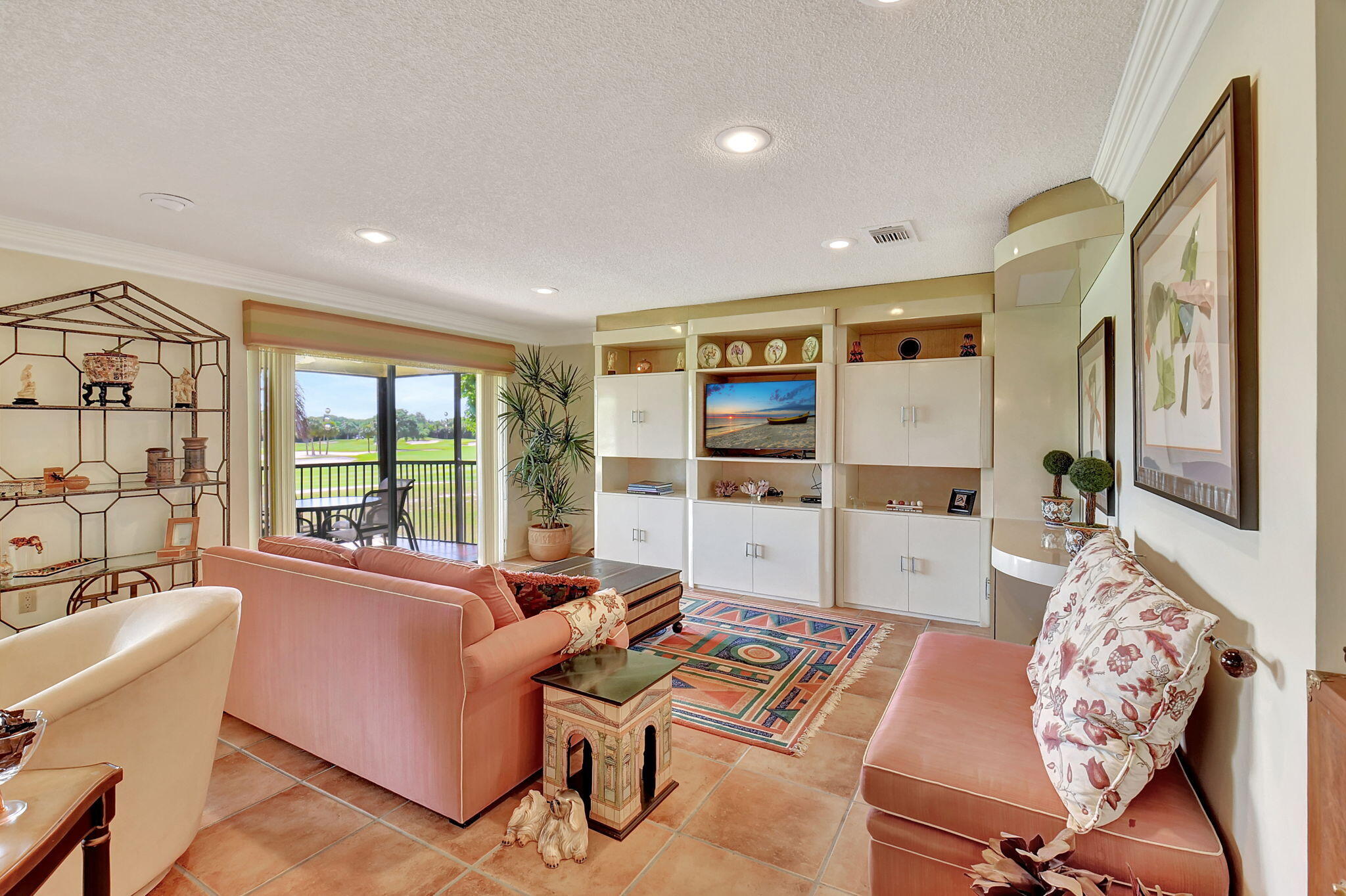 3 Stratford Drive, Unit H Boynton Beach, FL 33436 - Photo 17 of 81 a living room with furniture fireplace and large window