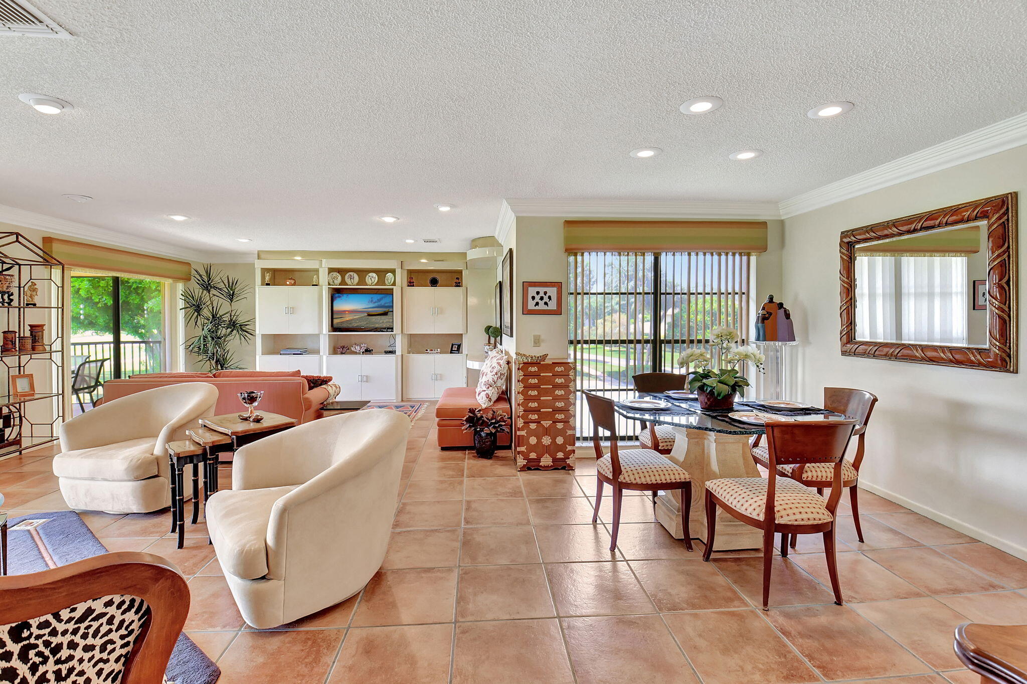 3 Stratford Drive, Unit H Boynton Beach, FL 33436 - Photo 18 of 81 a living room with furniture and large windows