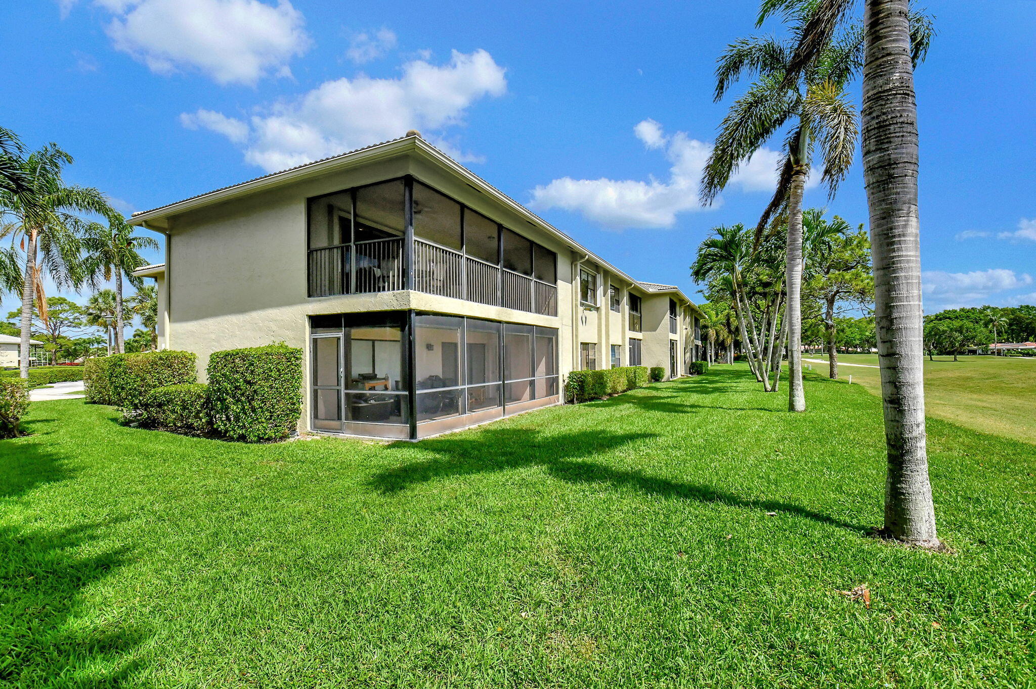 3 Stratford Drive, Unit H Boynton Beach, FL 33436 - Photo 2 of 81 a view of a house with yard and plants