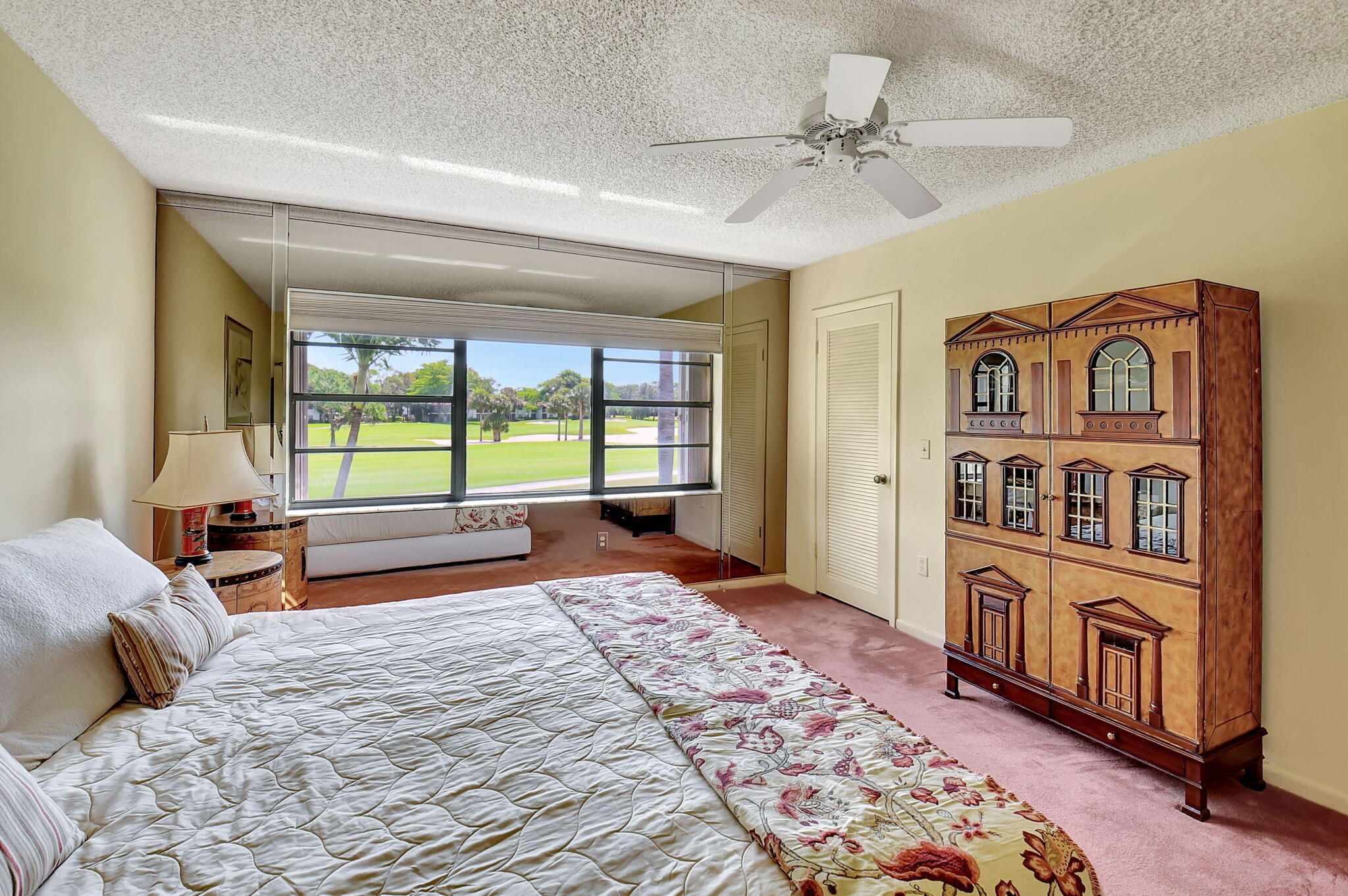 3 Stratford Drive, Unit H Boynton Beach, FL 33436 - Photo 22 of 81 a bedroom with furniture and a window