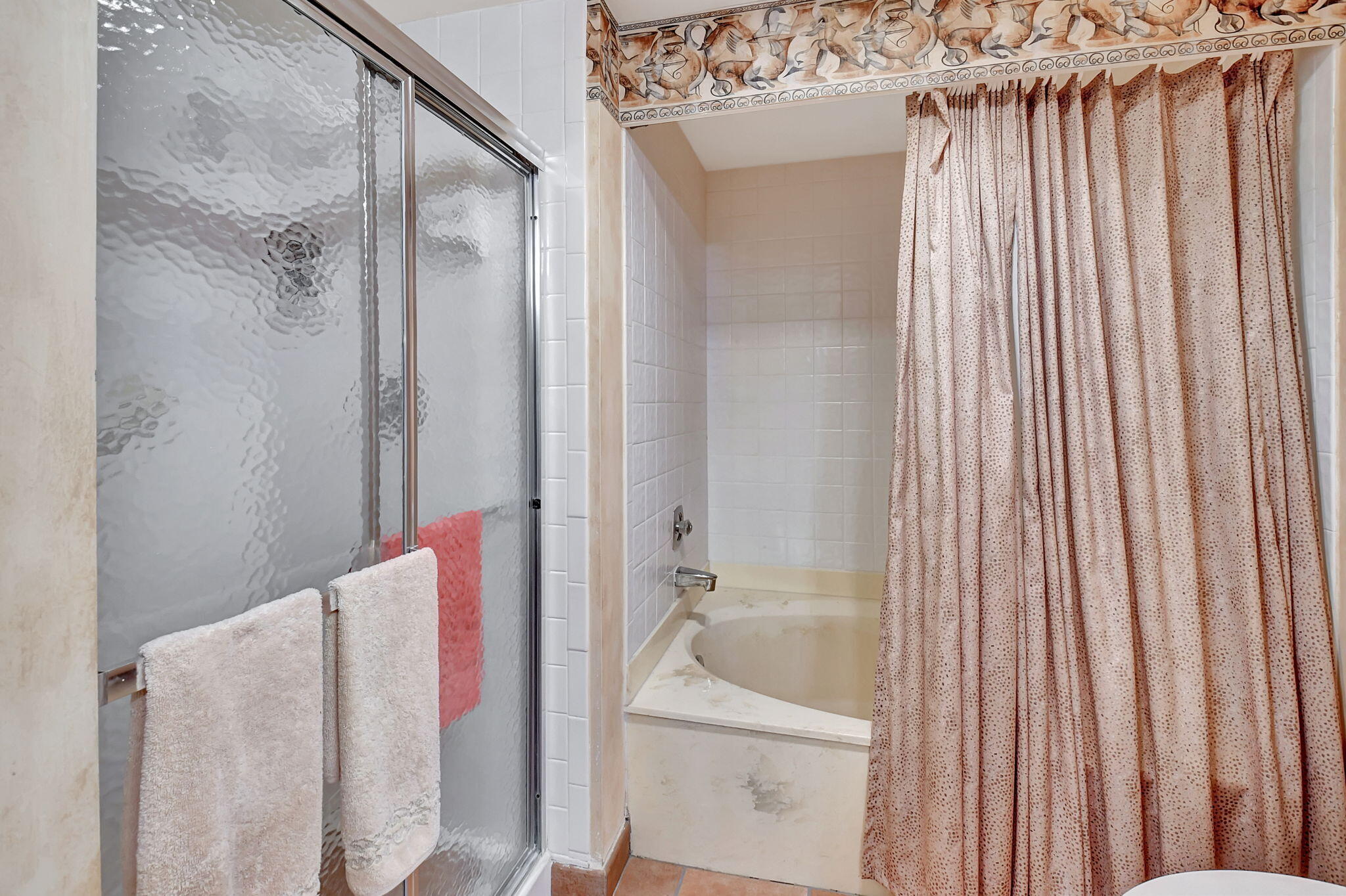 3 Stratford Drive, Unit H Boynton Beach, FL 33436 - Photo 26 of 81 a bathroom with a shower curtain and a sink
