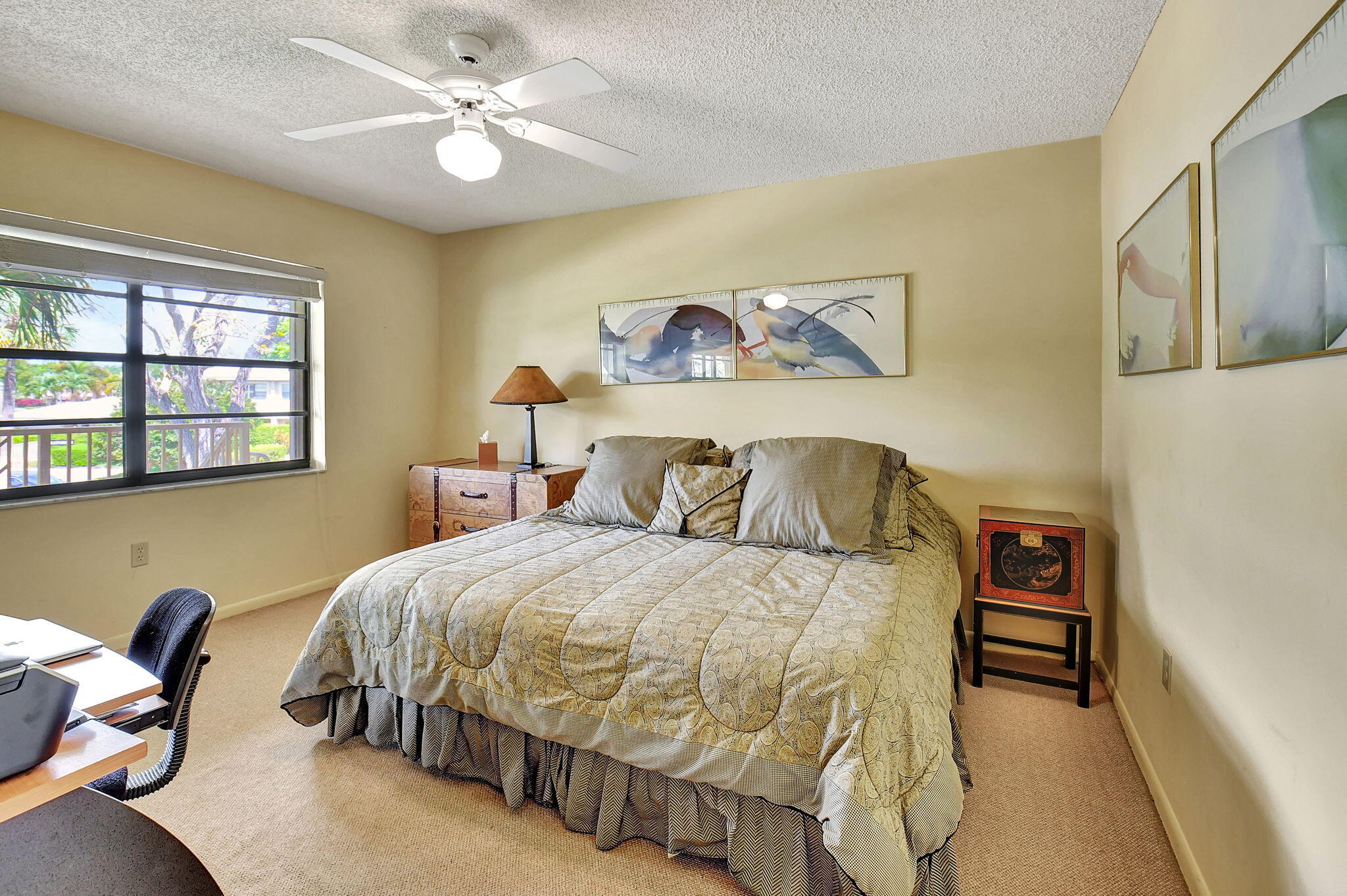 3 Stratford Drive, Unit H Boynton Beach, FL 33436 - Photo 28 of 81 a bedroom with a bed and a table with chair
