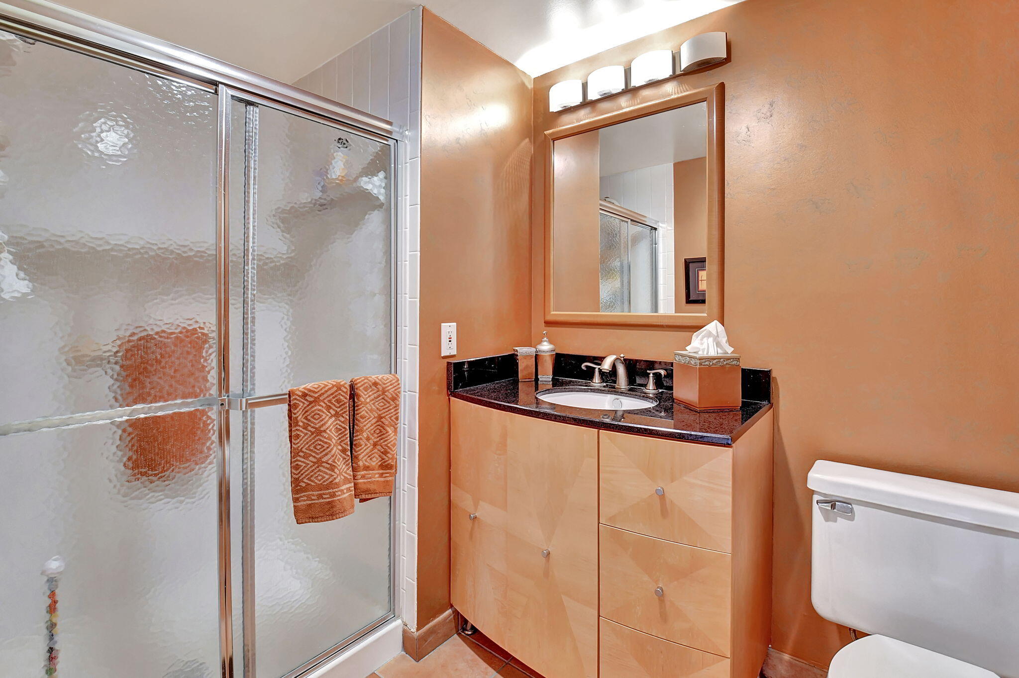 3 Stratford Drive, Unit H Boynton Beach, FL 33436 - Photo 29 of 81 a bathroom with a sink and mirror