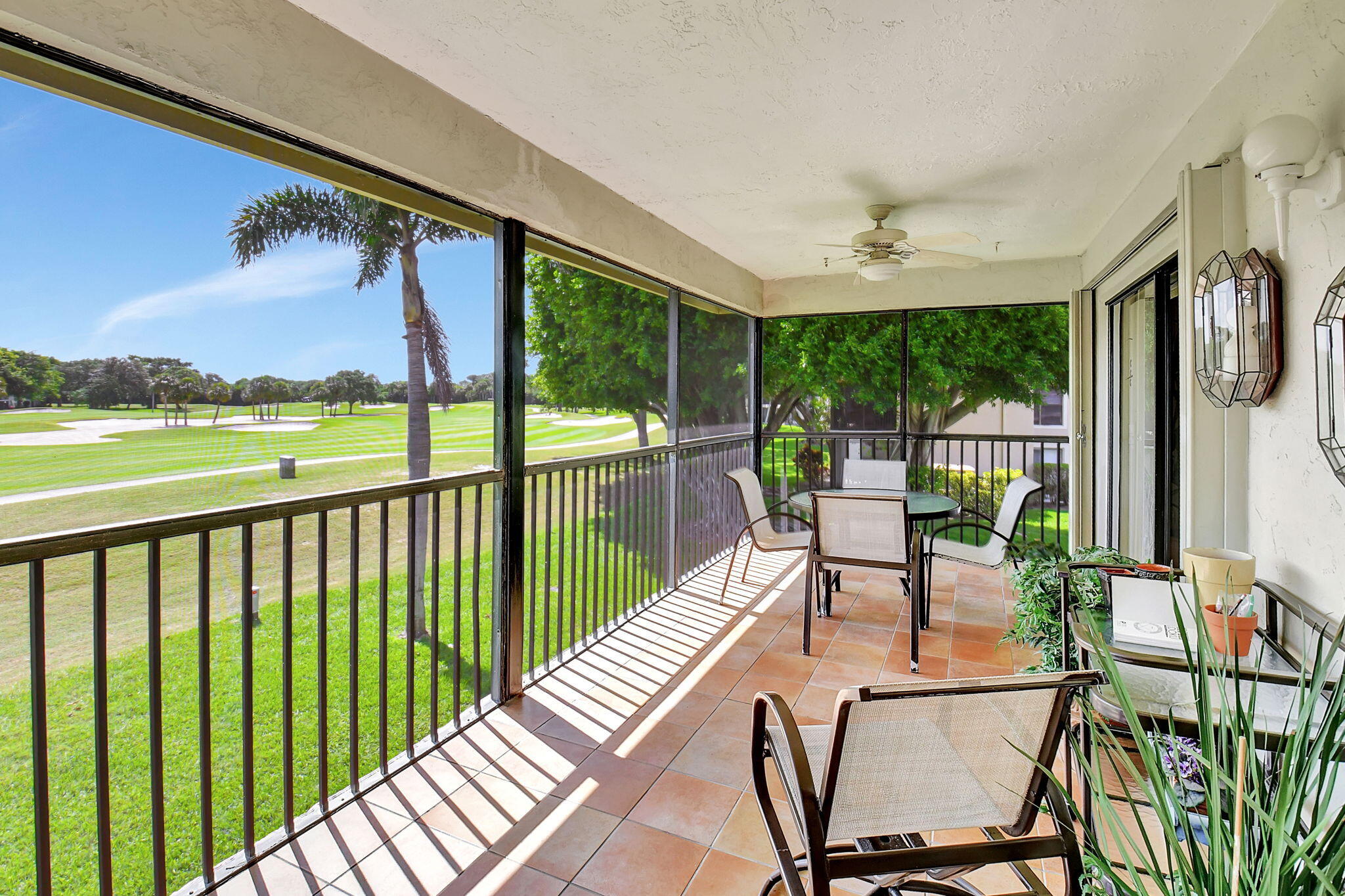 3 Stratford Drive, Unit H Boynton Beach, FL 33436 - Photo 30 of 81 a view of a balcony with chairs and a table
