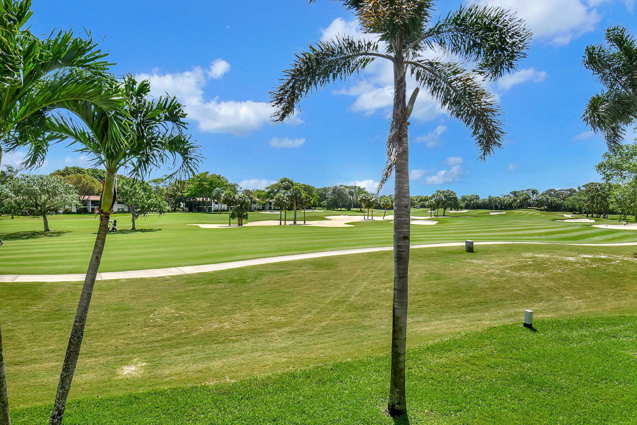 3 Stratford Drive, Unit H Boynton Beach, FL 33436 - Photo 34 of 81 a view of a swimming pool with a yard