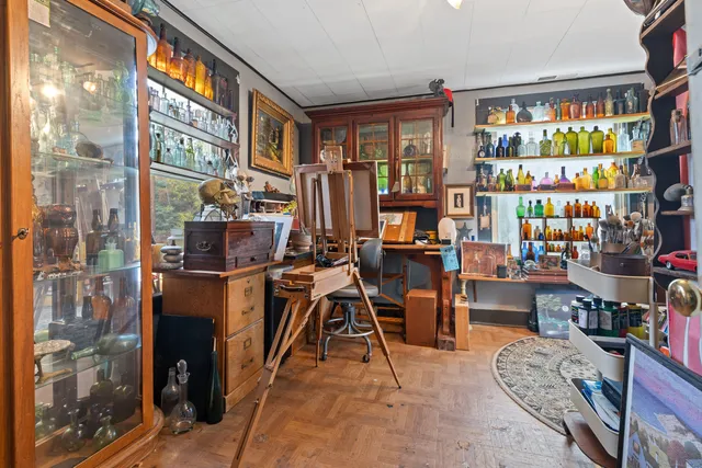 a view of a workspace with furniture