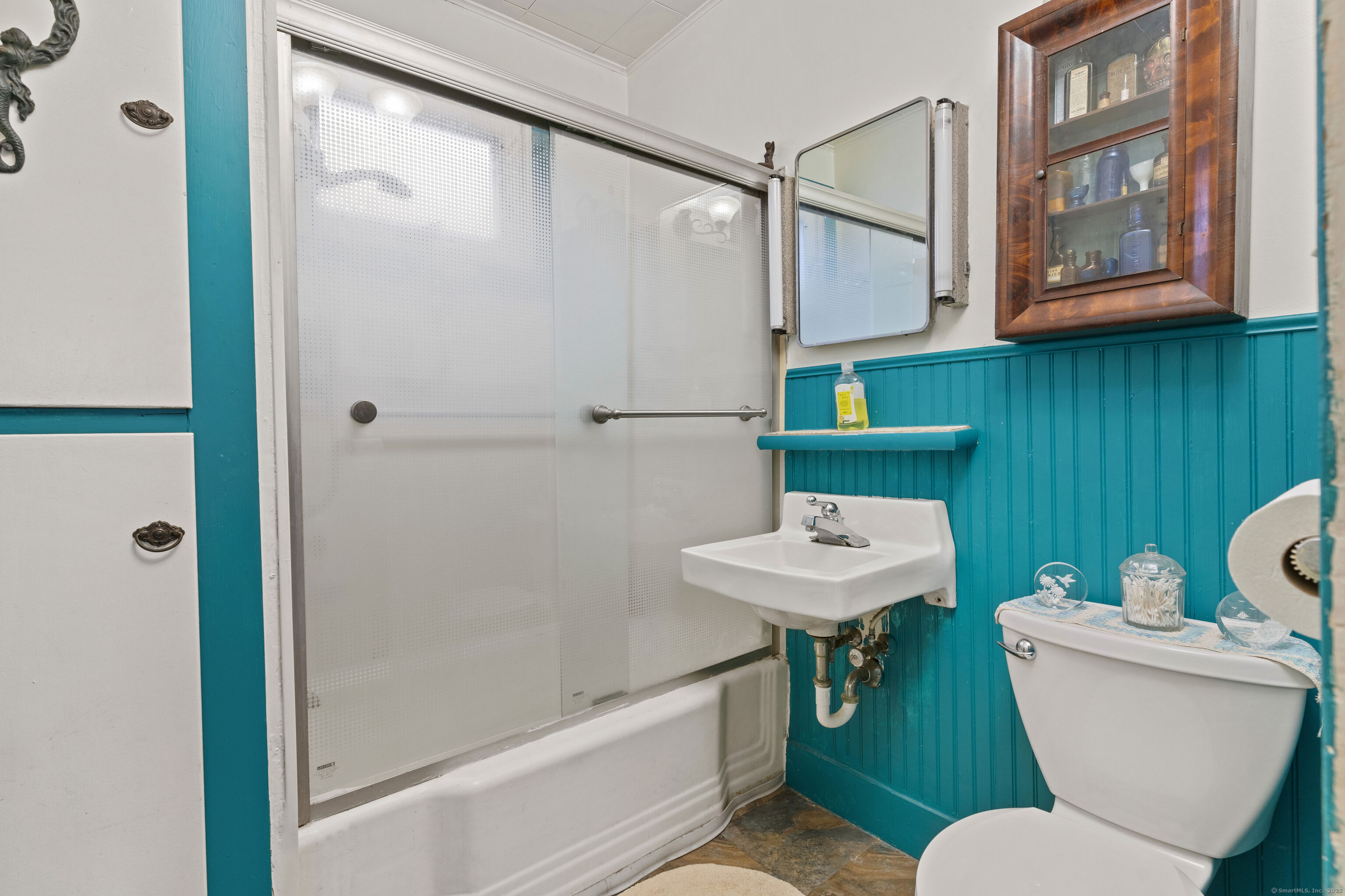 104 Judson Street Thomaston, CT 06787 - Photo 14 of 24 a bathroom with a sink a toilet and shower