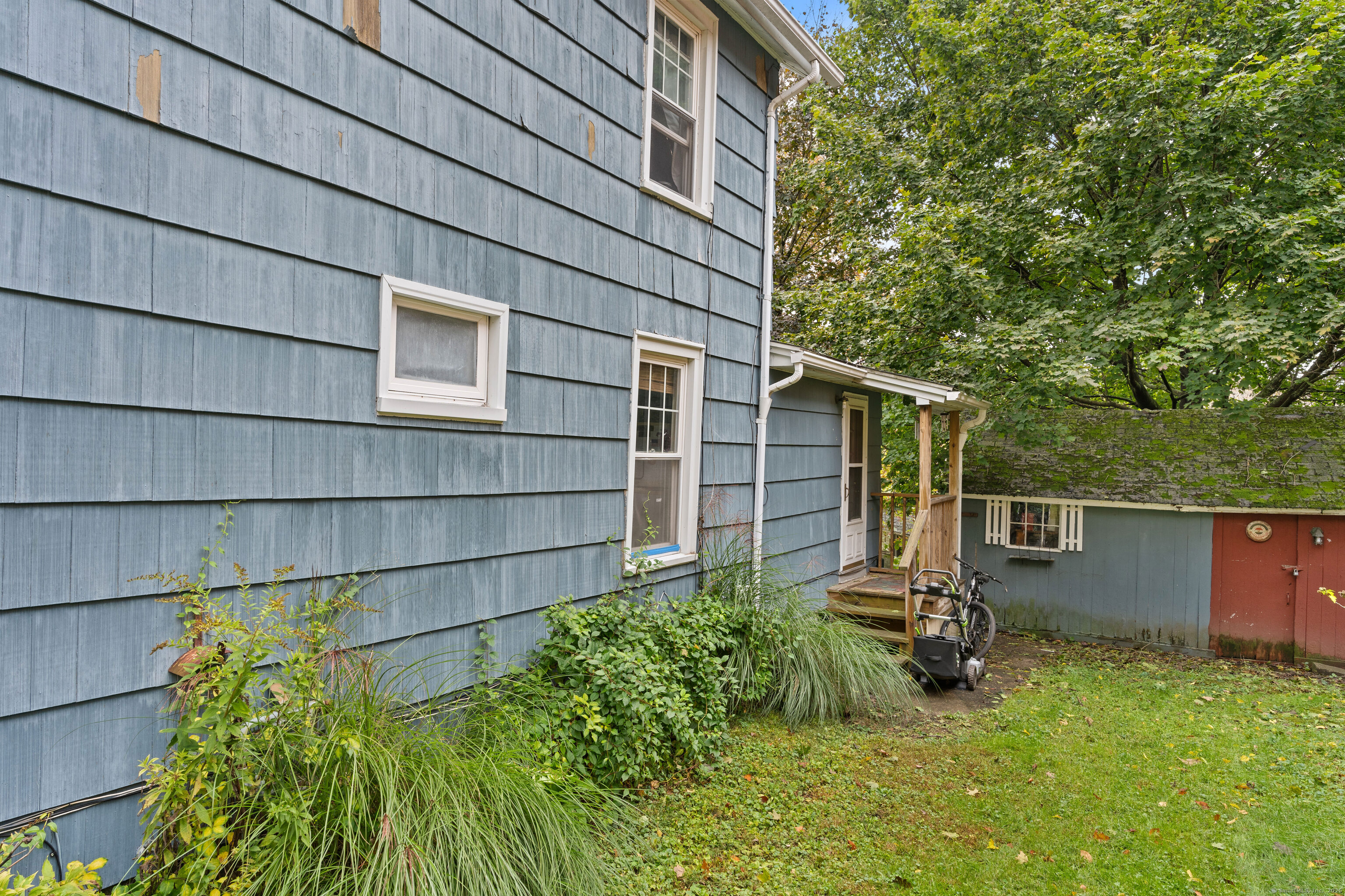 104 Judson Street Thomaston, CT 06787 - Photo 18 of 24 a backyard of a house