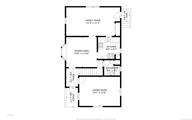 a view of a backyard with a table and chairs and a large tree