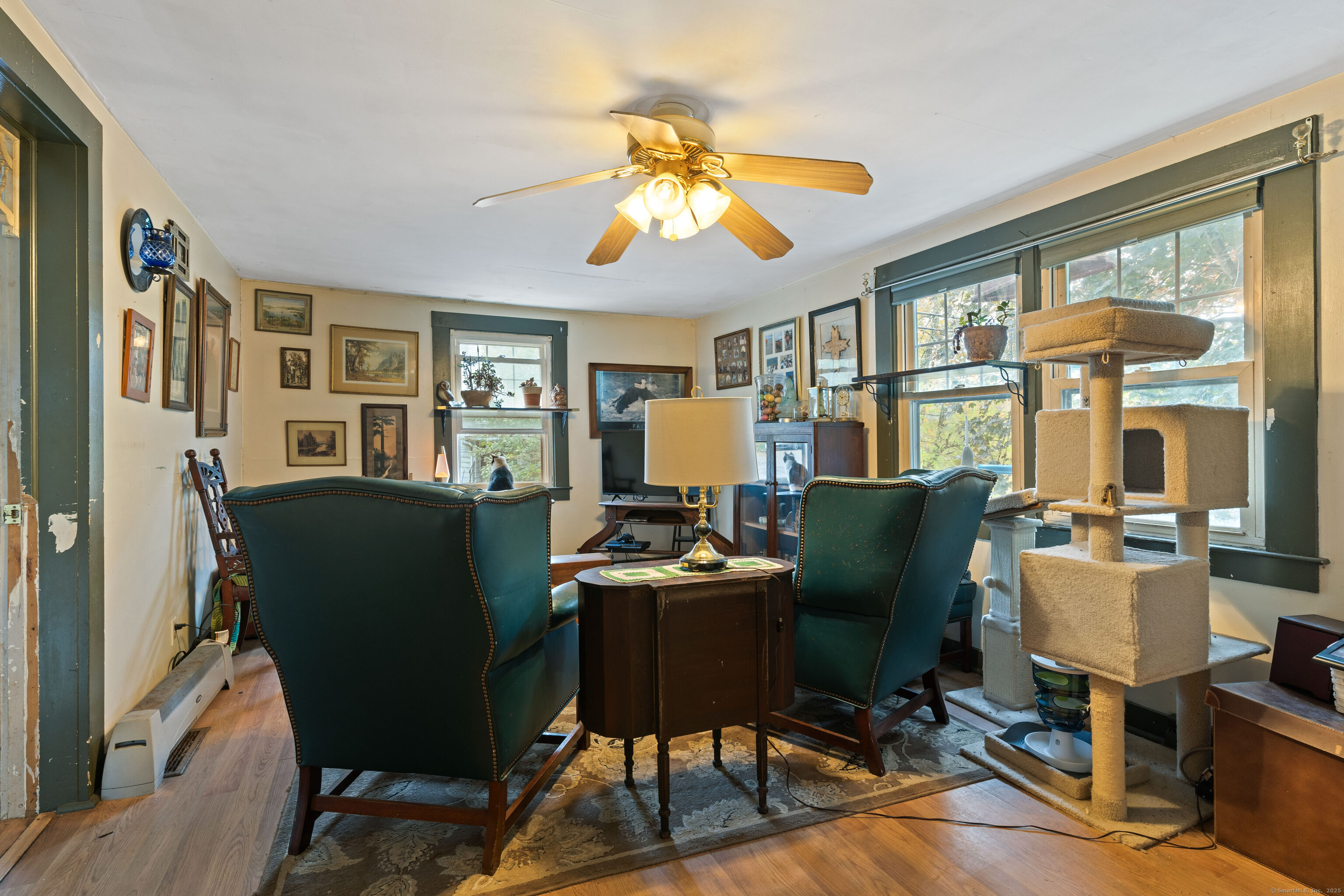 104 Judson Street Thomaston, CT 06787 - Photo 9 of 24 a living room with furniture and a window