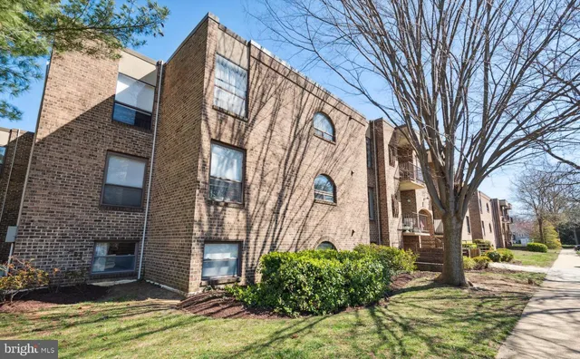 a brick building with a large windows