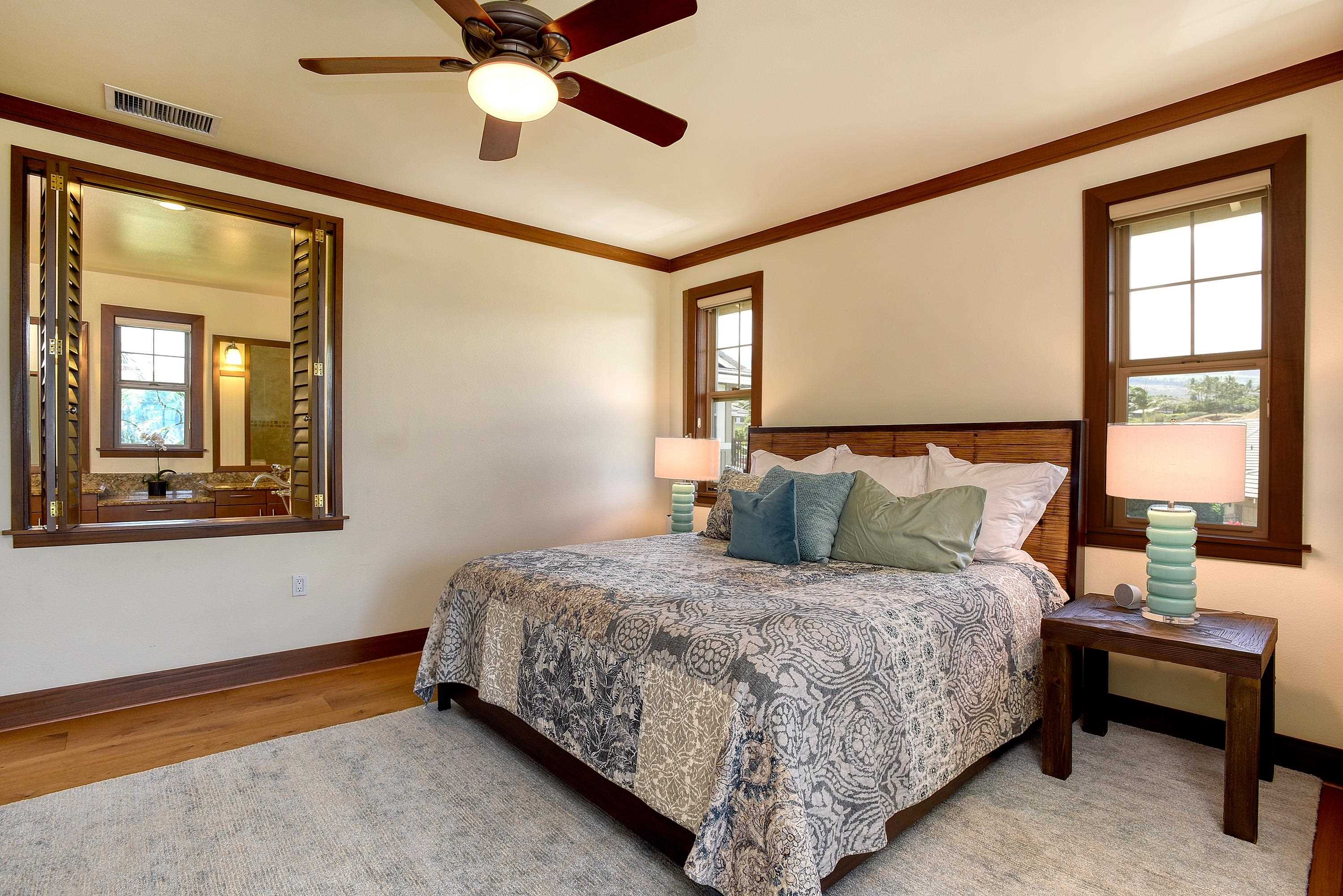 71 Poailani Place, Unit 14 Kihei, HI 96753 - Photo 10 of 23 a bedroom with a bed and window