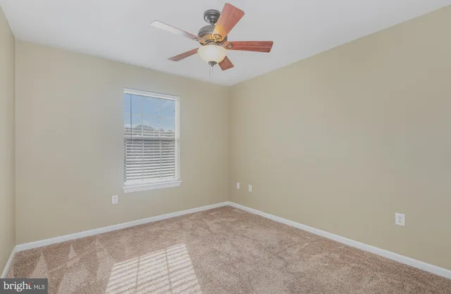 a view of a room with a window