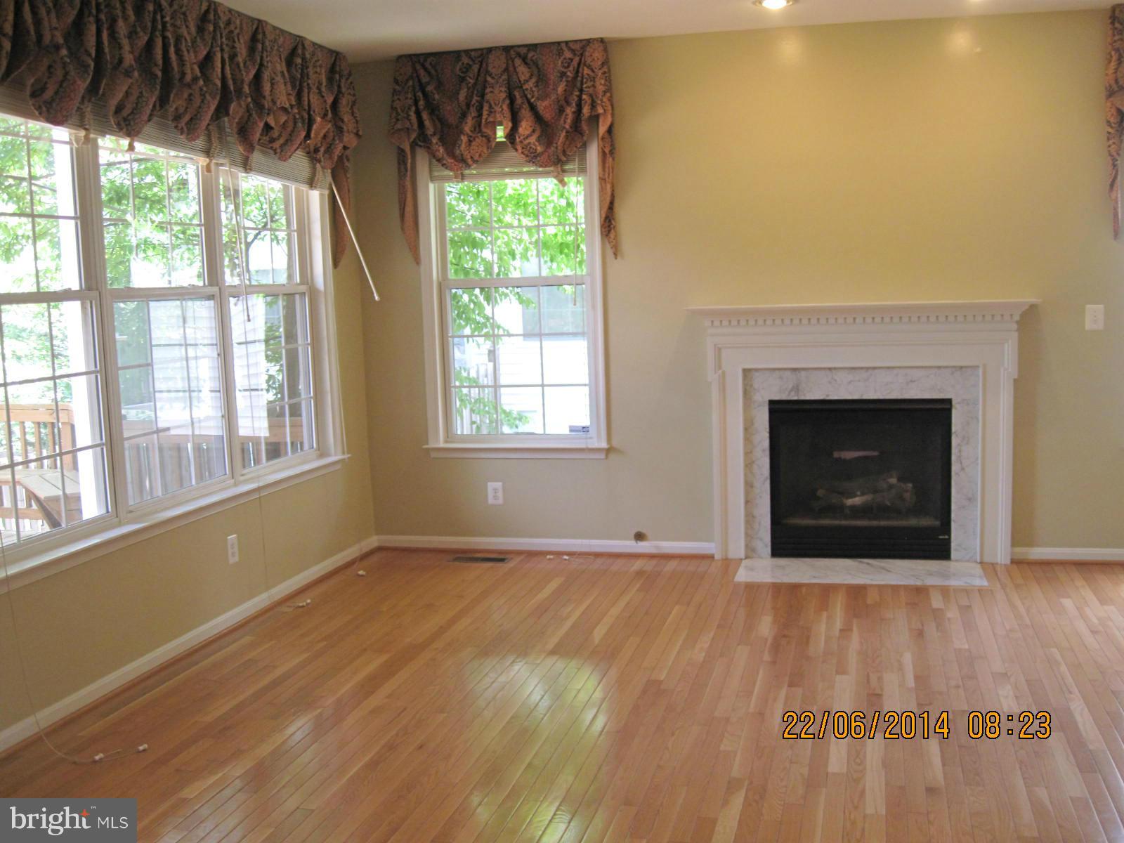 2049 Madrillon Road Vienna, VA 22182 - Photo 11 of 26 Family Room w/gas fireplace