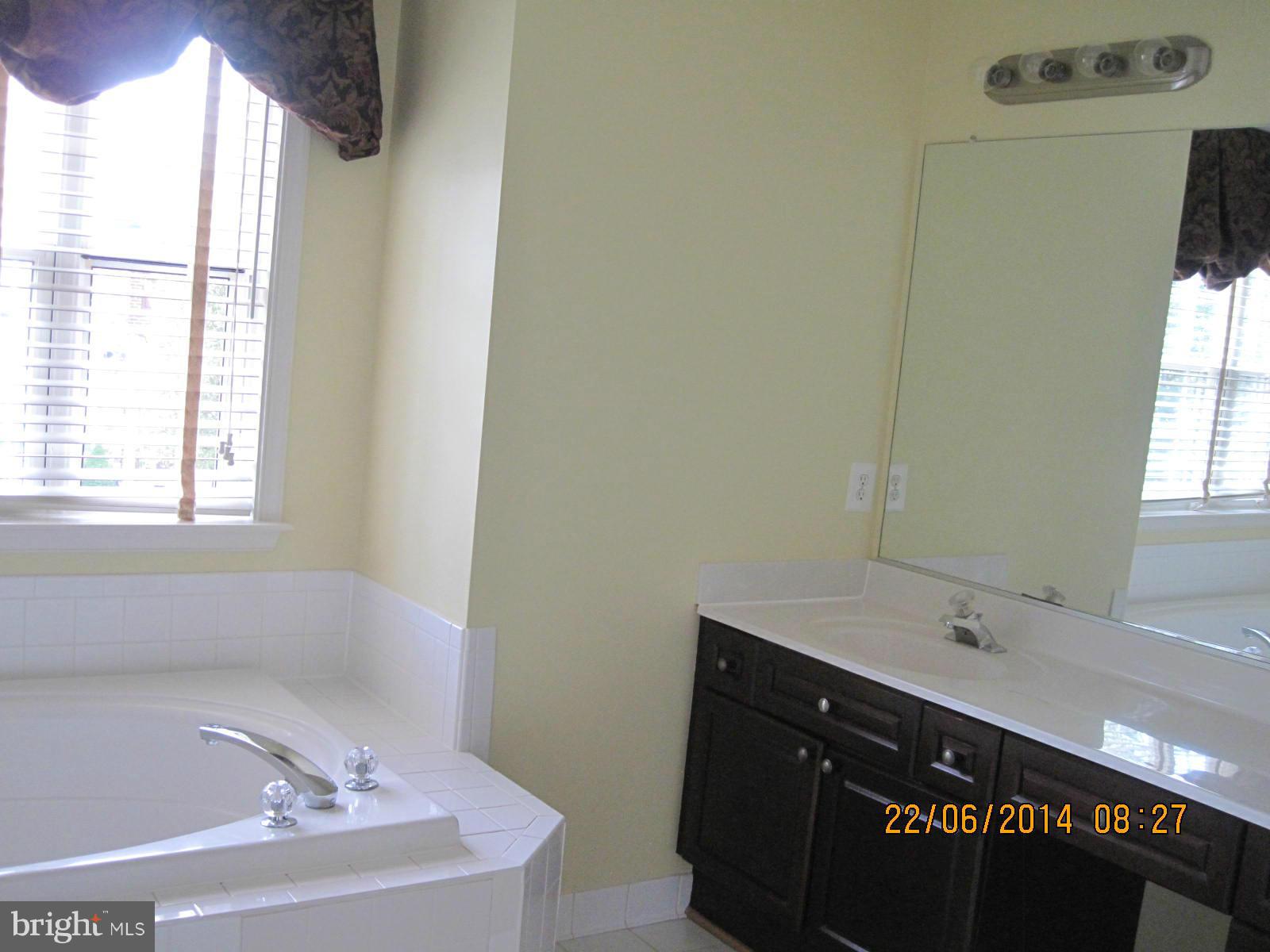 2049 Madrillon Road Vienna, VA 22182 - Photo 23 of 26 Bath with soaking tub and Shower