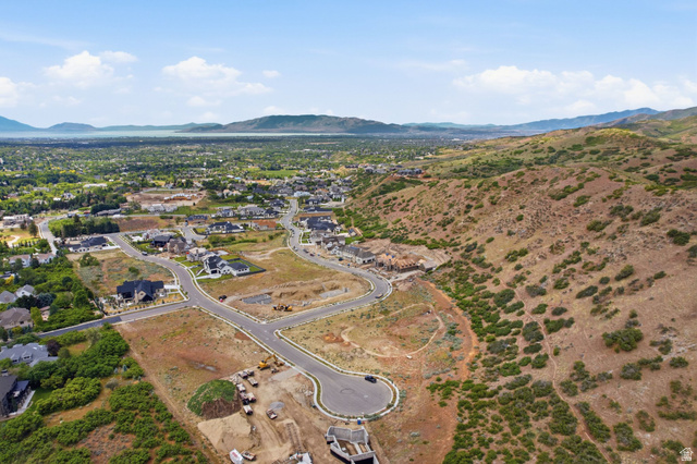 1817 North Dean Court, Unit 12 Alpine, UT 84004 - Photo 26 of 38 Expansive aerial perspective showcasing a developing residential community with existing homes and vacant lots