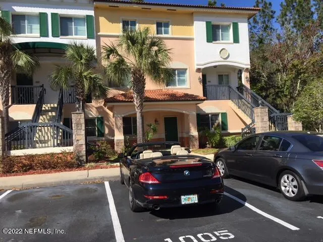 a car parked in front of a building