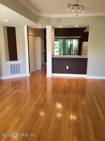 a kitchen that has a sink and a window