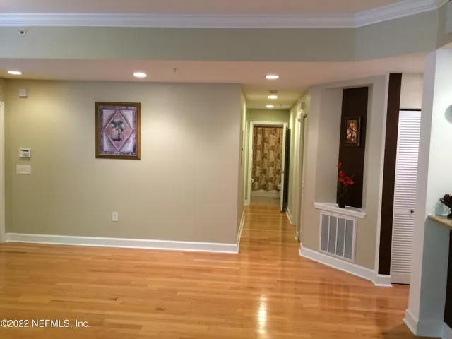 a bathroom with a shower curtain and a sink
