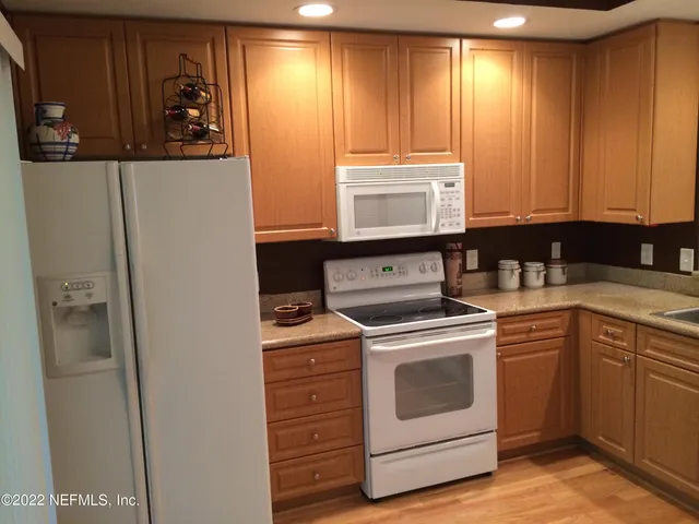 a view of small space with wooden floor