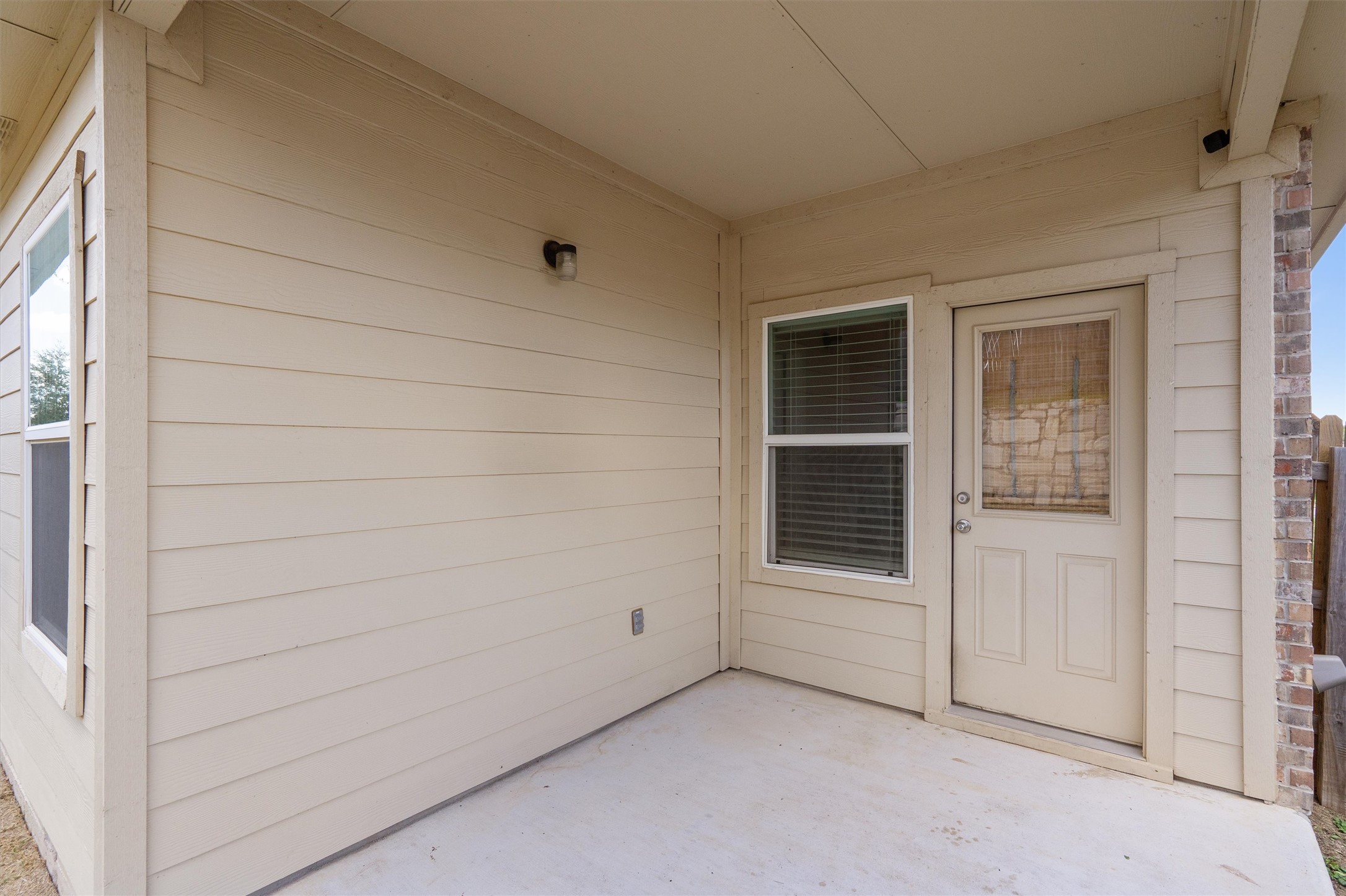 10817 Gonzales Ranger Pass Austin, TX 78754 - Photo 30 of 37 Stepping out the back door, you’ve got a fully covered patio area!