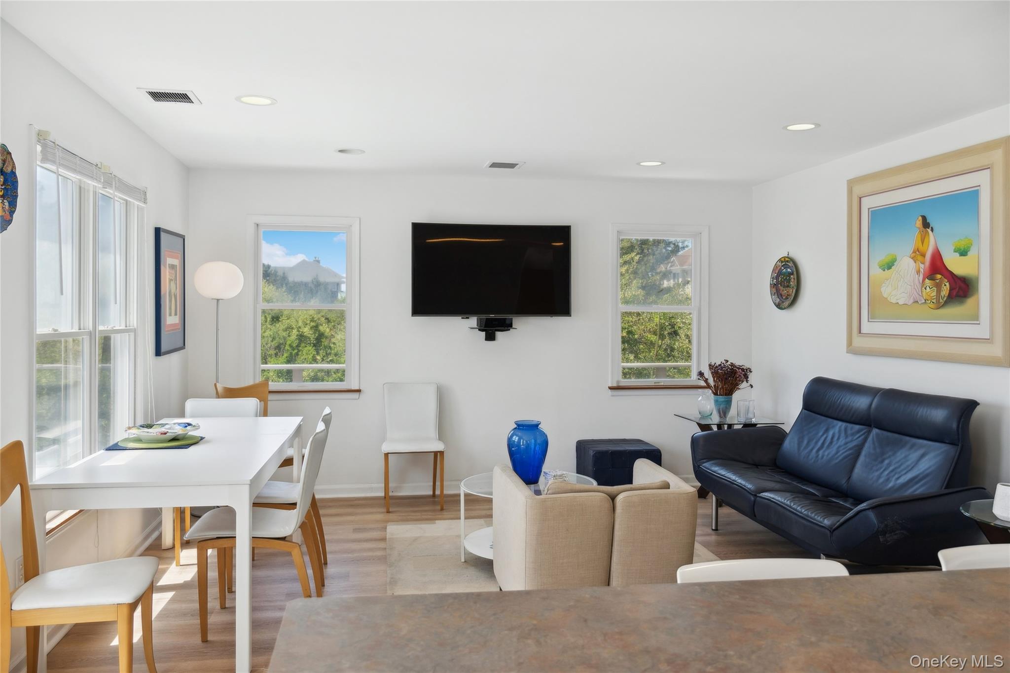 846 Dune Road Westhampton Beach, NY 11978 - Photo 13 of 34 Living area featuring light wood finished floors, baseboards, visible vents, and recessed lighting