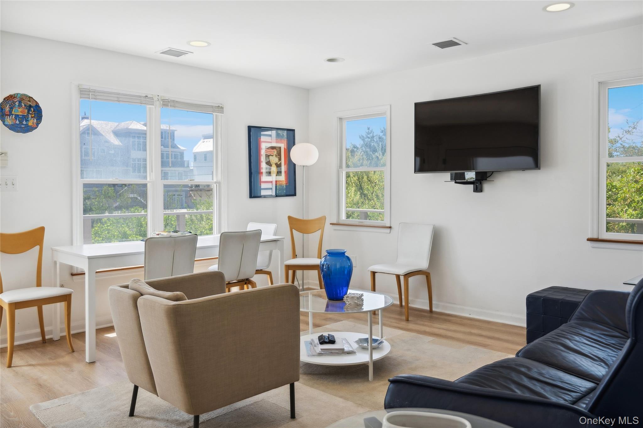 846 Dune Road Westhampton Beach, NY 11978 - Photo 16 of 34 Living room featuring plenty of natural light and visible vents