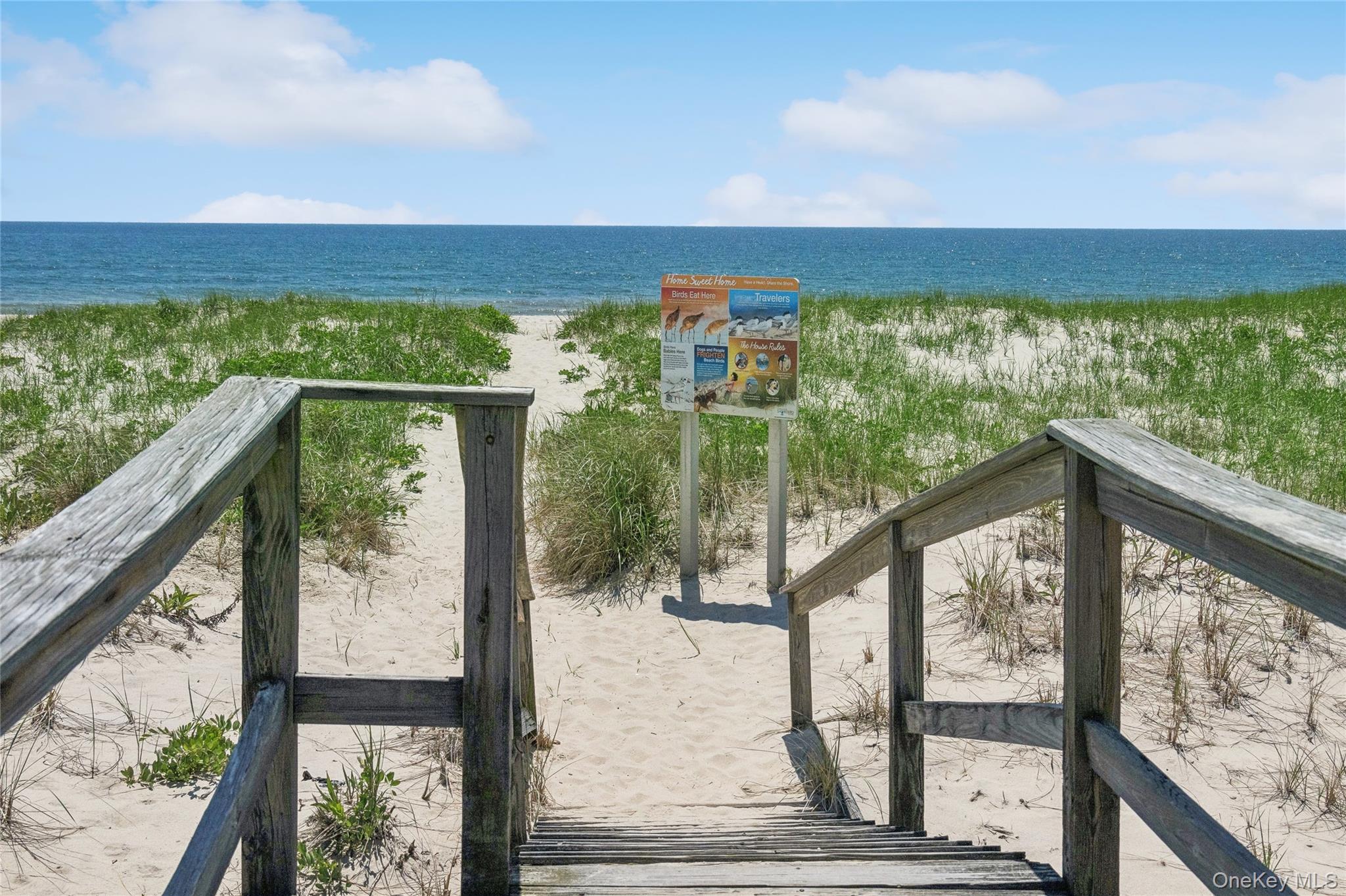 846 Dune Road Westhampton Beach, NY 11978 - Photo 26 of 34 Property view of water featuring a beach view