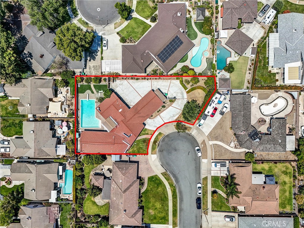 an aerial view of houses with outdoor space