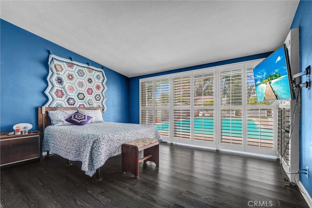 994 North Cleveland Street Orange, CA 92867 - Photo 29 of 53 a bedroom with a bed and a large window