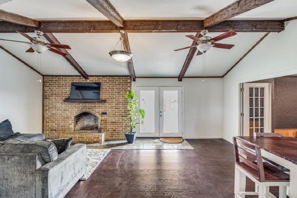 3550 Whiteley Road Wylie, TX 75098 - Photo 6 of 25 a living room with furniture and a fireplace